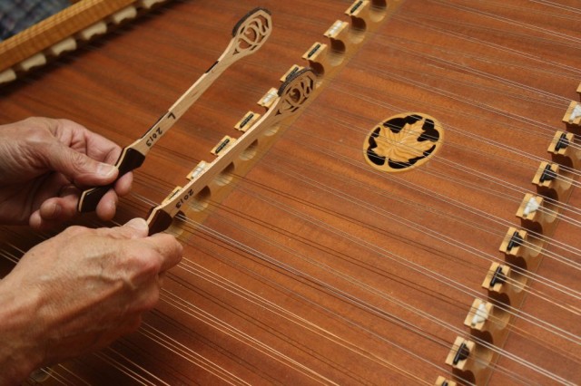 Center yourself on the hammered dulcimer’s treble bridge